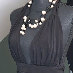 Betsy Johnson pearl and skeleton necklace